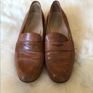 Barney’s New York tan leather loafers.